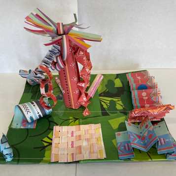 Paper sculpture using a range of recycled and origami paper