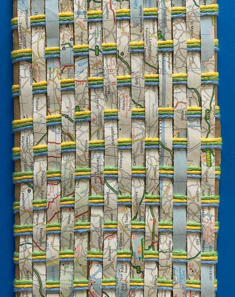 Weaving using old map paper and wool on cardboard