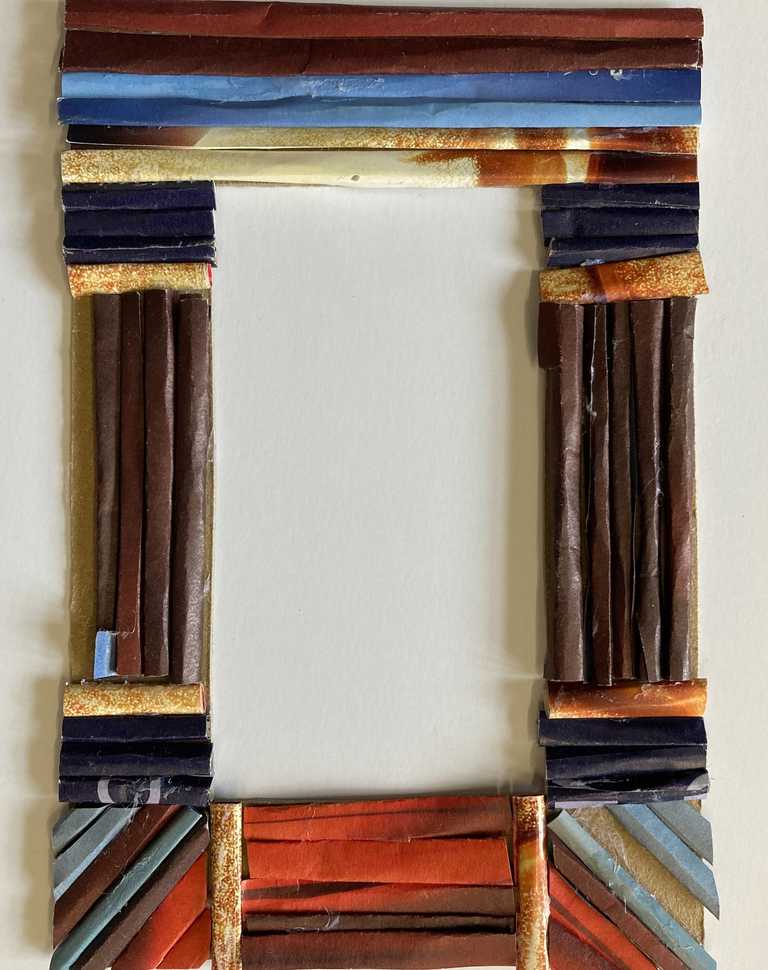 Frame using rolled magazine paper on cardboard