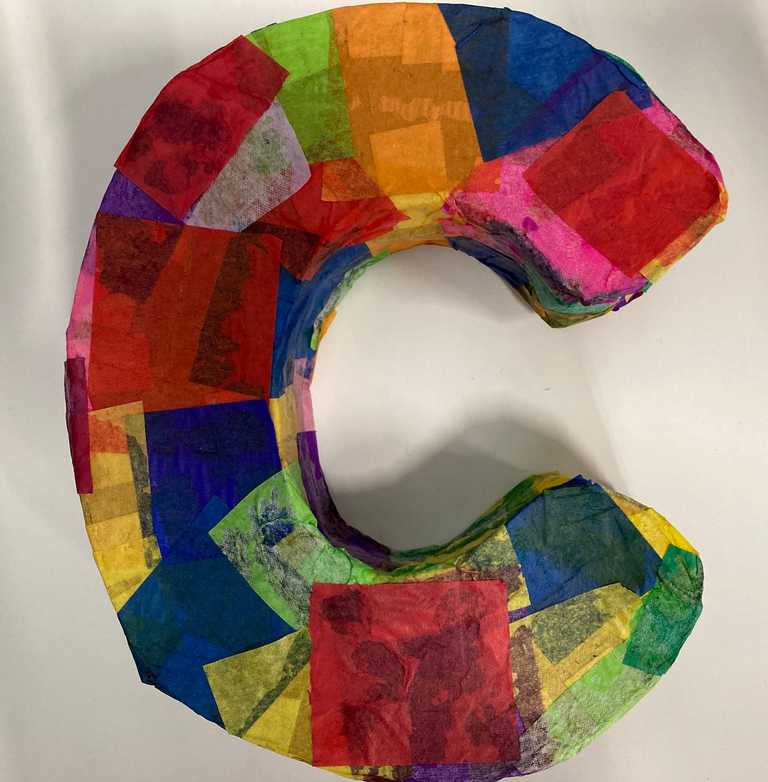 Letter 'C' using recycled cardboard and tissue paper