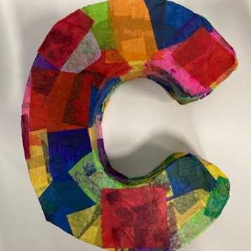 Letter 'C' using recycled cardboard and tissue paper